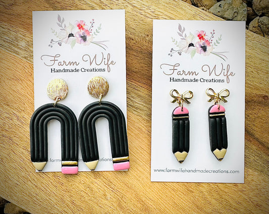 Gold and black pencil earrings