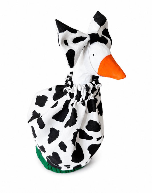 Cow print dress and bow for desk goose